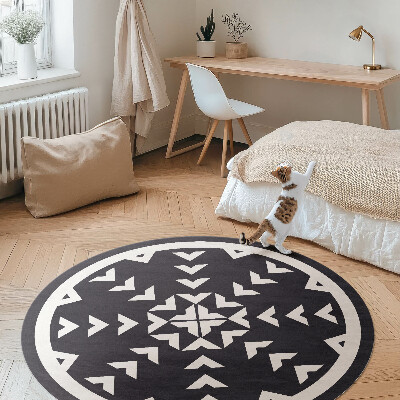 Kulatý vinylový koberec Bílé šipky vzor na tmavém pozadí