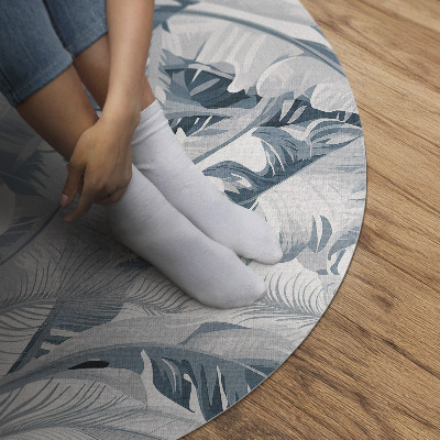 Kulatý vinylový koberec Elegantní listy glamour modré rostliny