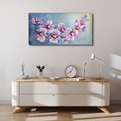 Obraz na plátně Květinové orchideje na modrém pozadí