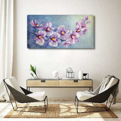 Obraz na plátně Květinové orchideje na modrém pozadí