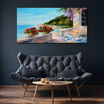 Obraz na plátně Pobřeží květy mořská obloha
