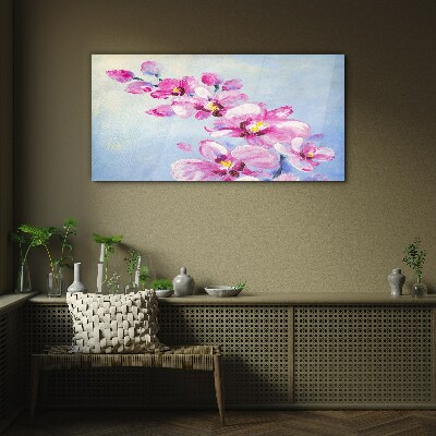 Obraz na skle Růžové orchideje na modrém pozadí