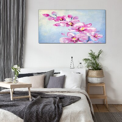 Obraz na skle Růžové orchideje na modrém pozadí