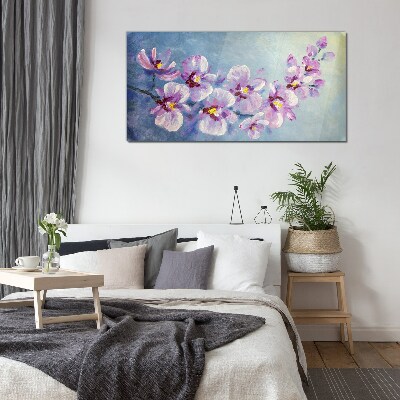 Obraz na skle Květinové orchideje na modrém pozadí