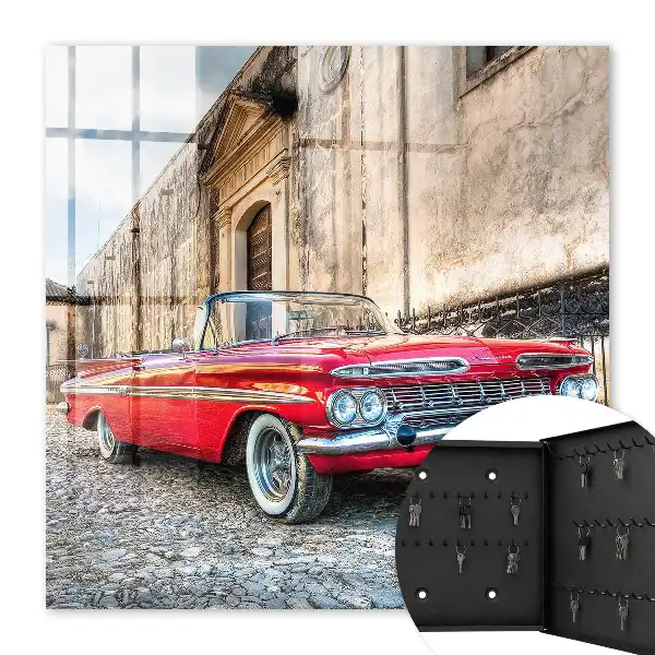 Retro auto na pozadí architektury