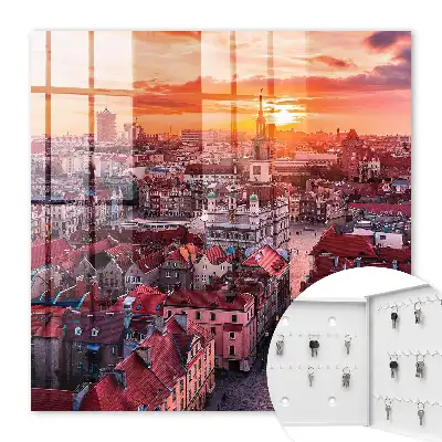 Západ slunce nad historickými střechami