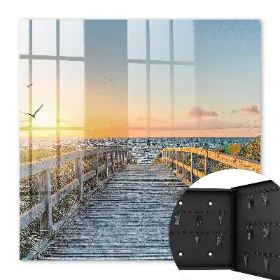 Cesta při západu slunce k oceánu