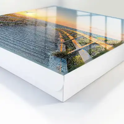 Cesta při západu slunce k oceánu